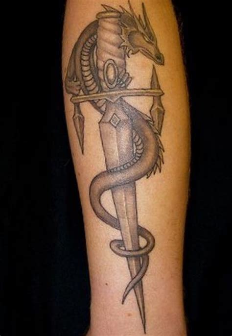 Dragon Sword Tattoo | Dragon tattoo ankle, Sword tattoo, Celtic dragon tattoos