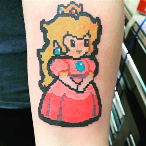 Princess peach tattoo | Peach tattoo, Nerd tattoo, Tattoos