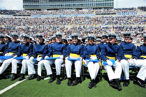 Cadets of the U.S. Air Force Academy's Class of 2015 sit with their diplomas during their ...