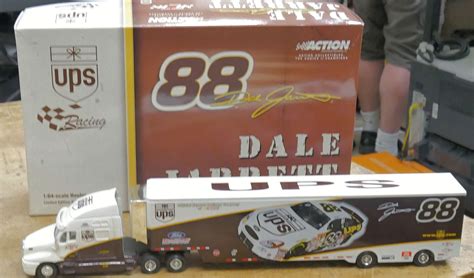 Cash USA Pawnshop. Dale Jarrett #88 UPS 2001 NASCAR Action 1/64 Hauler Transporter 1/3004. NEW ...