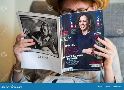 Woman Reading in Living Room the Latest Elle Magazine Featuring on ...