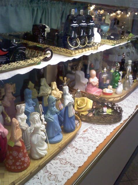 Diana's Gift Shop — Most of the AVON lady figurine bottles are now...