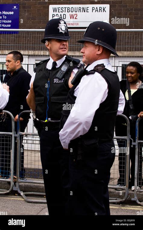 Notting Hill Carnival Parade two Metropolitan Police officers in ...