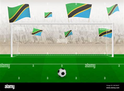 Tanzania football team fans with flags of Tanzania cheering on stadium ...