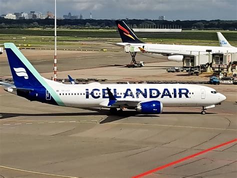 icelandair boeing 737 max with new livery at schiphol airport. : aviation