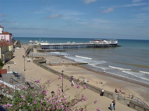 "The beach front at Cromer, with Cromer pier in the background, Norfolk" by Joy Davies at ...