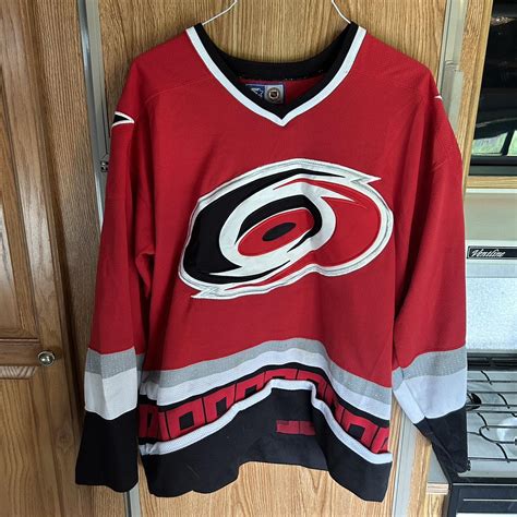 Carolina Hurricanes ice hockey jersey. Size large!... - Depop