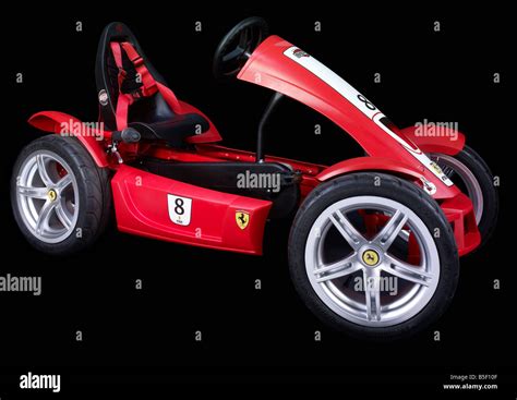 Red Ferrari pedal car Stock Photo - Alamy