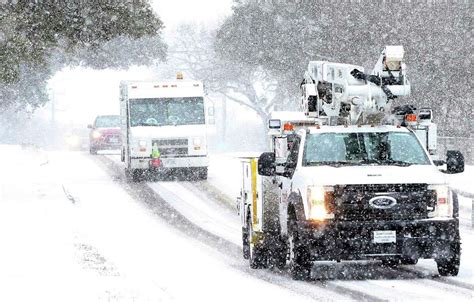 Photos show snow falling in San Antonio, Texas