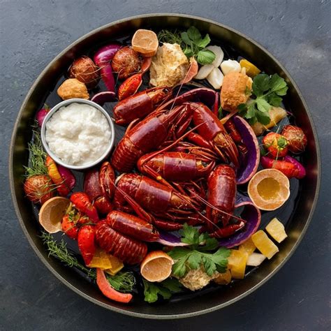 Premium Photo | Gourmet Boiled Crawfish Platter Premium Seafood Delight