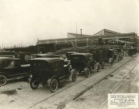 Photo: Model T cars are lined up outside the Ford Motor Co. assembly ...