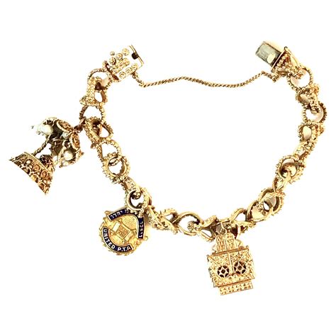 Gold Charm Bracelet at 1stDibs