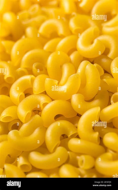 Dry Organic Macaroni Elbow Pasta in a Bowl Stock Photo - Alamy