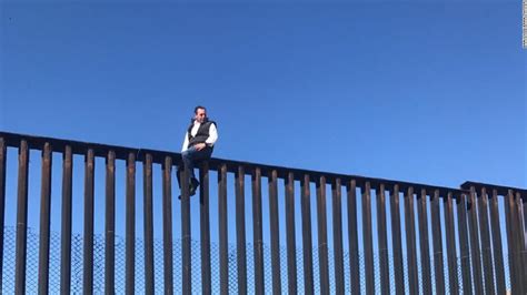 Mexican lawmaker climbs border wall in stunt aimed at US President Trump - CNN