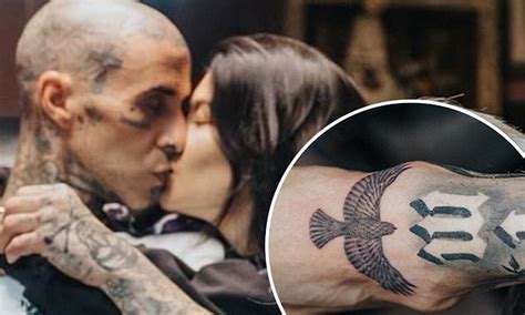 Kourtney Kardashian shares kiss with Travis Barker as he pays tribute to Taylor Hawkins with ...