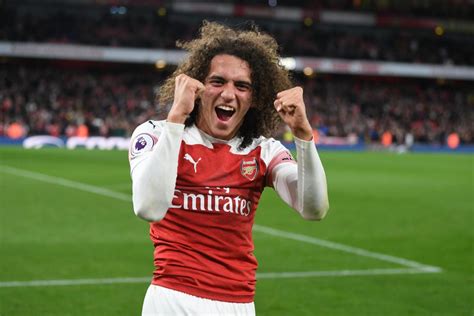 Arsenal man Matteo Guendouzi celebrates in car with jubilant fans after ...