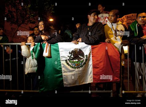 Fans of the Mexican National Soccer team wait outside the Oakland Convention Center as they try ...