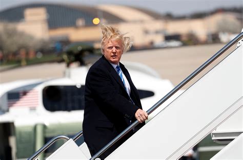 PHOTOS: The Wind Got The Best Of POTUS On His Way To West Virginia | The Daily Caller