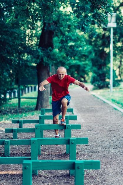 Premium Photo | Senior man exercising outdoors