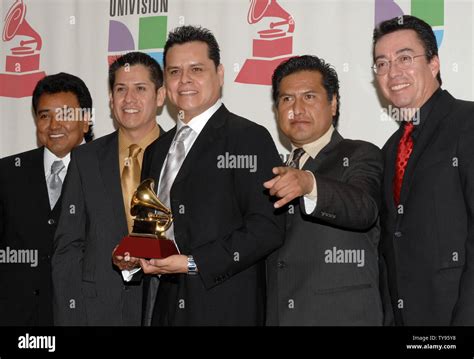 Members of Grupo Bryndis from Mexico celebrate their win for best grupero album for "Solo Pienso ...