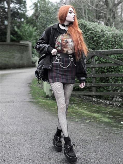 Black jacket with graphic tee, choker, tartan mini skirt, fishnet ...