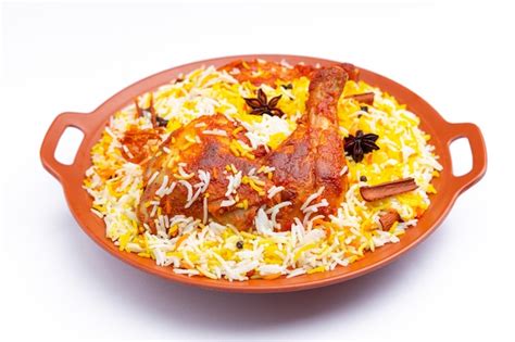 Premium Photo | Mandi chicken biryani indian chicken biryani using ...