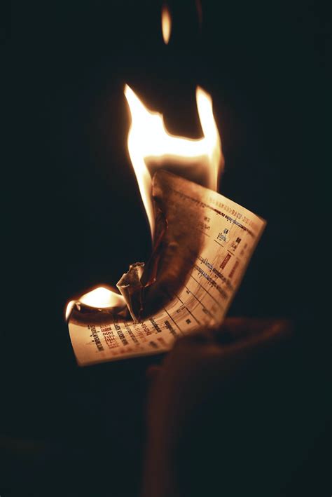 Burning Paper Inside Dark Room · Free Stock Photo