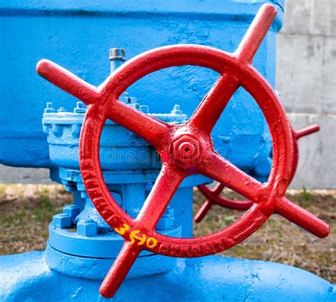 Red valve on the blue pipe stock photo. Image of point - 149331692