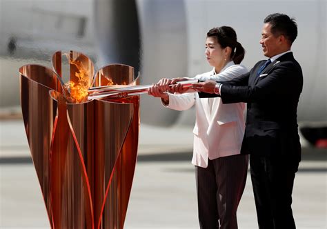 Olympic flame to be carried by car in Japan leg of torch relay - Chinadaily.com.cn