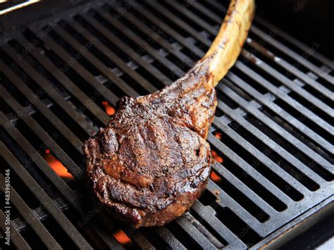 tomahawk steak Stock Photo | Adobe Stock