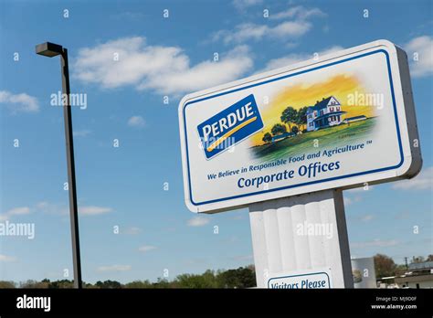 A logo sign outside of the headquarters of Perdue Farms in Salisbury ...