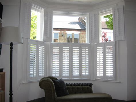 Related image colonial style shutters | Bay window living room, White ...