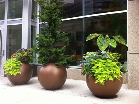 Fiberglass Round Planters by Jay Scotts | Planters Etc | Fiberglass planters, Landscaping ...