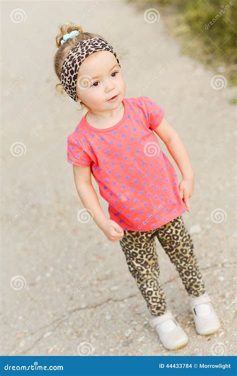 Smiling baby girl outdoors stock photo. Image of fashionable - 44433784