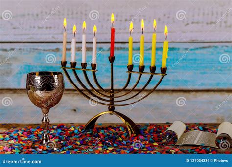 Illuminated Hanukkah Menorah Candles on Gold Menorah Stock Photo - Image of glowing, chanukiah ...