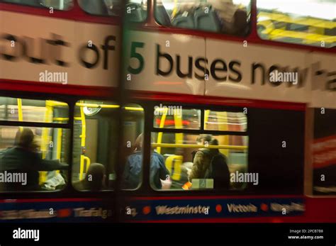 London double decker bus in motion at night Stock Photo - Alamy