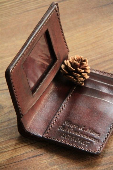 Genuine bifold leather wallet with ID window and customized stamping. Phone Wristlet, Trifold ...