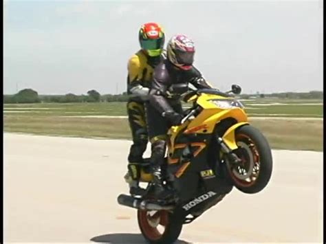 Two Person Wheelie Fail Damages Bike | Jukin Media Inc