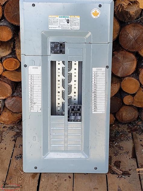 100 amp electrical panel box with a double 30 amp breaker - Winterland ...