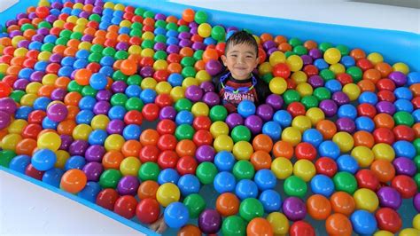 Giant Inflatable Kids Pool Full Of Balls Superhero Surprise Toys Hunt ...