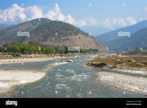 Bhutan, View of Punakha Valley at riverside Stock Photo - Alamy