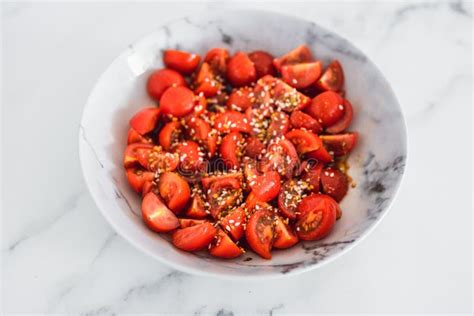 Fresh Ripe Cherry Tomatoes Cut into Cubes Seasoned with Olive Oil ...