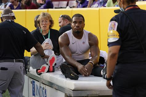 Ravens RB J.K. Dobbins to have injured left knee examined | AP News