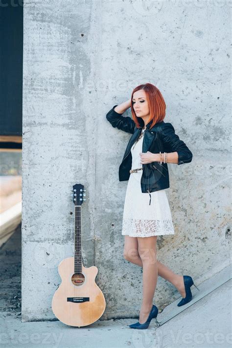 young girl with red hair with an acoustic guitar 2377150 Stock Photo at ...