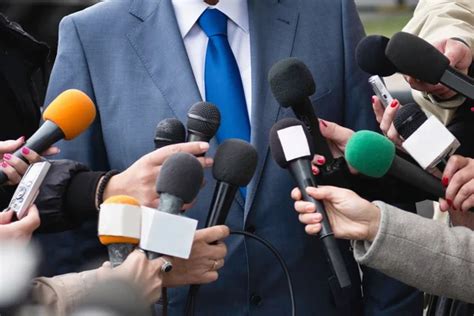 journalists surrounding politician - Stock Image - Everypixel