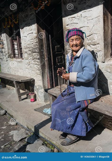 Traditional Nepali Village Life. Old Woman Resting at the Front of Her House Editorial Photo ...