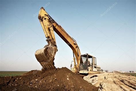 Digging with an excavator — Stock Photo © shime02 #94821714