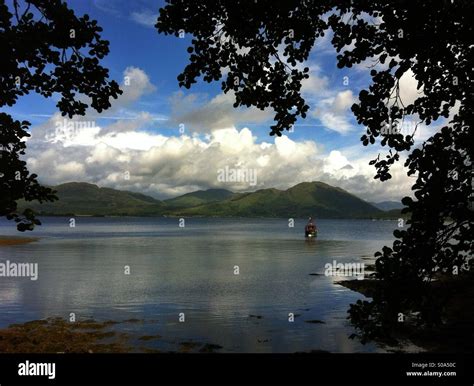 Scottish landscape showing loch and hills Stock Photo - Alamy