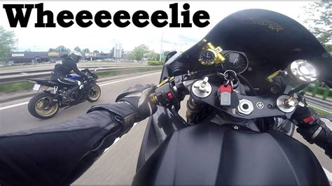 How to wheelie a Yamaha R1 - YouTube