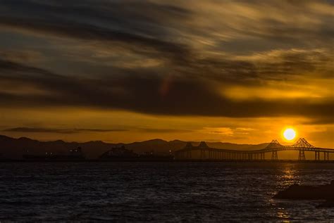 Silhouetted Richmond–San Rafael Bridge at Sunset · Free Stock Photo